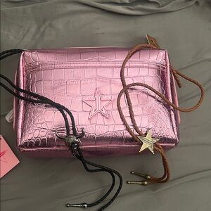 Jefree star makeup bag and bolo ties lot